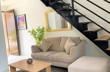 Gallery image 7 — living area beneath the stair